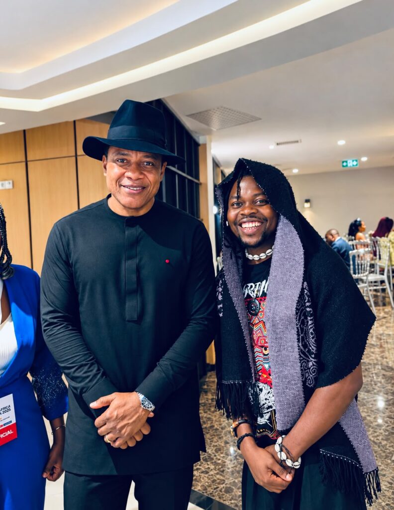 Penboy with the CEO of Dangote Cameroon, Bertrand Mbouck